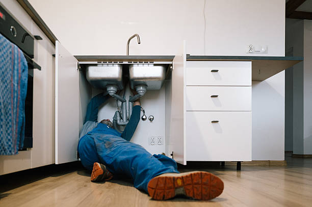 Professional Drain Cleaning technician working in Calverton, MD